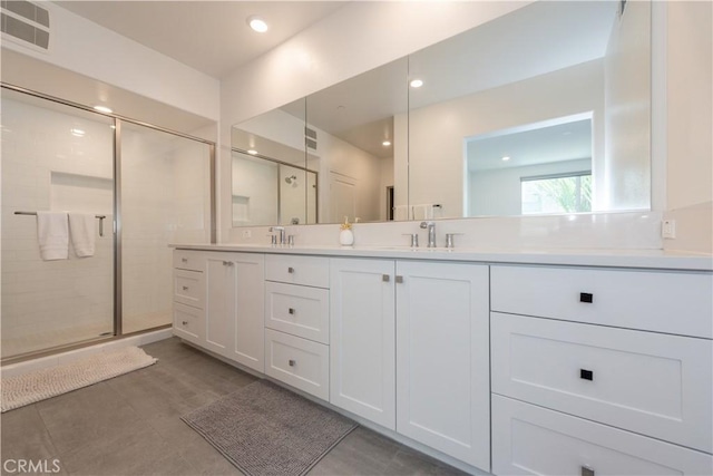 1851 S Union St Unit 10, Anaheim, CA 92805 - bathroom featuring double vanity, a stall shower, and recessed lighting