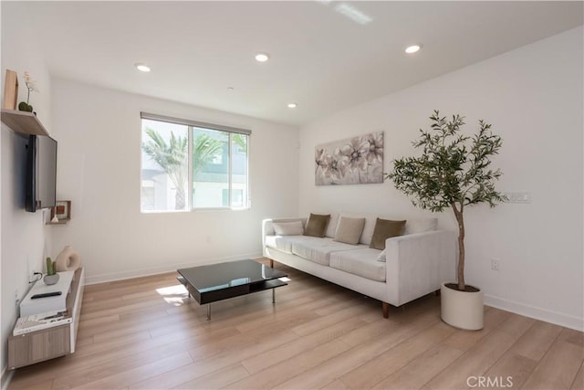 1851 S Union St Unit 10, Anaheim, CA 92805 - living area with light wood finished floors and recessed lighting
