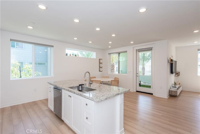 1851 S Union St Unit 10, Anaheim, CA 92805 - kitchen with dishwasher, light wood-style flooring, a kitchen island with sink, white cabinets, and recessed lighting