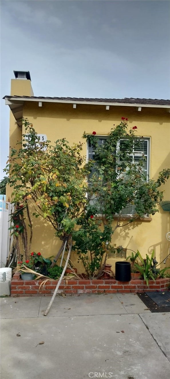 11735 Keith Dr, Whittier, CA 90606 - view of property exterior with stucco siding and a patio