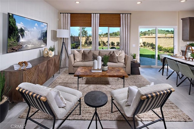 8176 Perada St, Jurupa Valley, CA 92509 - living area with recessed lighting and light tile patterned floors