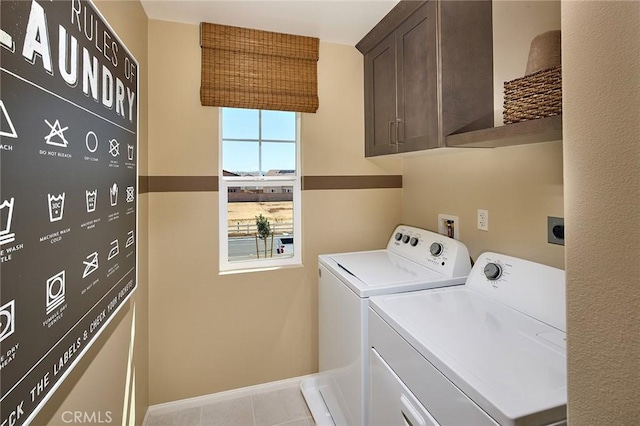 8176 Perada St, Jurupa Valley, CA 92509 - washroom with cabinet space, washing machine and dryer, and tile patterned flooring