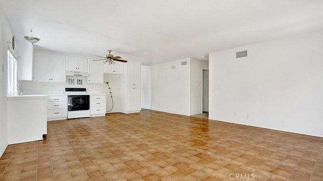 11542 Luzon St, Cypress, CA 90630 - unfurnished living room featuring ceiling fan and a sink