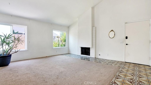 11542 Luzon St, Cypress, CA 90630 - unfurnished living room with a fireplace, carpet flooring, and high vaulted ceiling