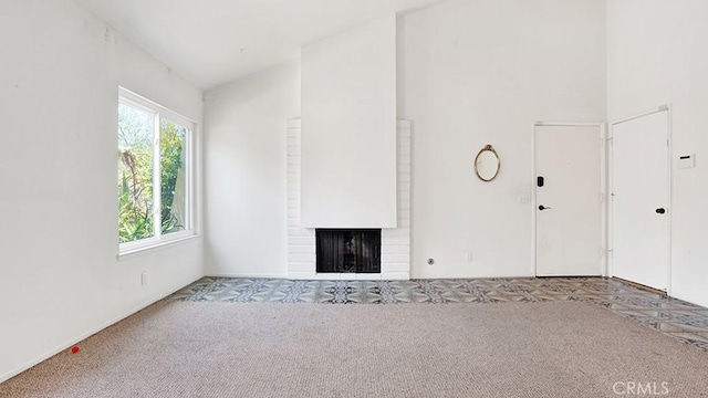 11542 Luzon St, Cypress, CA 90630 - unfurnished living room featuring carpet flooring and a fireplace