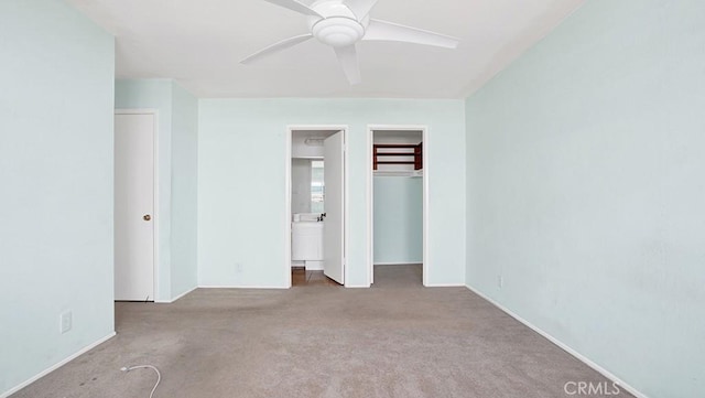 11542 Luzon St, Cypress, CA 90630 - unfurnished bedroom featuring carpet flooring, a ceiling fan, connected bathroom, and a closet