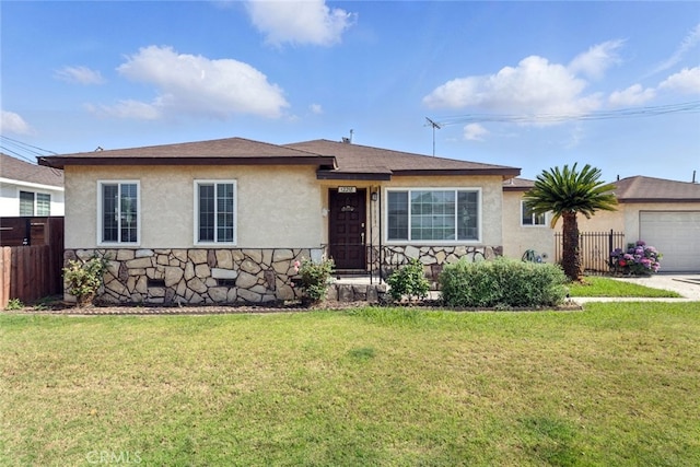 12218 Academy Way, Artesia, CA 90701 - view of front of house with stucco siding, a garage, and stone siding