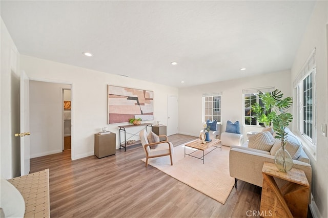 12218 Academy Way, Artesia, CA 90701 - living room featuring wood finished floors and recessed lighting