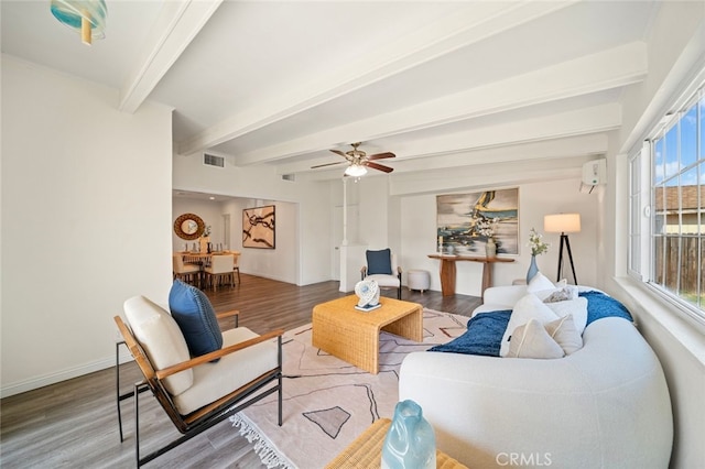 12218 Academy Way, Artesia, CA 90701 - living room with wood finished floors, beamed ceiling, and a ceiling fan