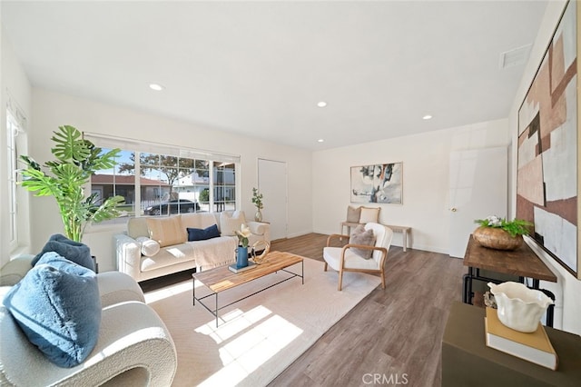 12218 Academy Way, Artesia, CA 90701 - living area featuring wood finished floors and recessed lighting