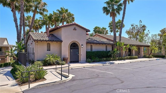 18977 Phelham Way, Yorba Linda, CA 92886 - mediterranean / spanish-style house featuring a tile roof, stucco siding, and uncovered parking