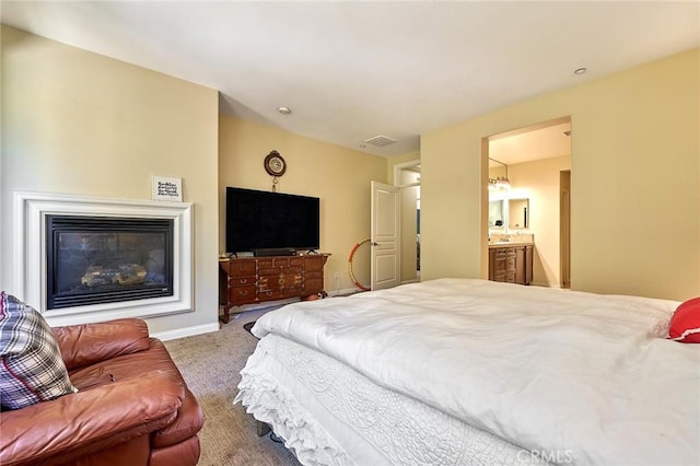 18977 Phelham Way, Yorba Linda, CA 92886 - bedroom with carpet flooring, a glass covered fireplace, and ensuite bath