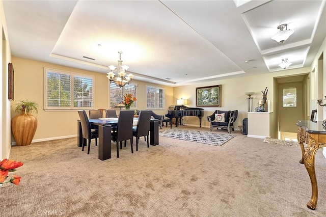 18977 Phelham Way, Yorba Linda, CA 92886 - dining room with a tray ceiling, a chandelier, and carpet flooring