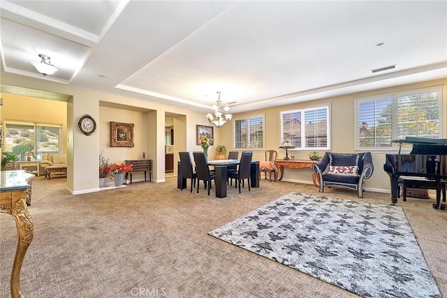 18977 Phelham Way, Yorba Linda, CA 92886 - carpeted dining area with a chandelier and a tray ceiling