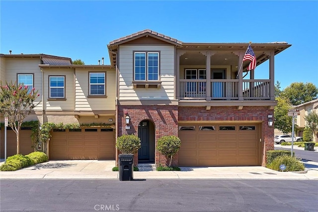 18977 Phelham Way, Yorba Linda, CA 92886 - view of front of property featuring a balcony, a garage, and brick siding
