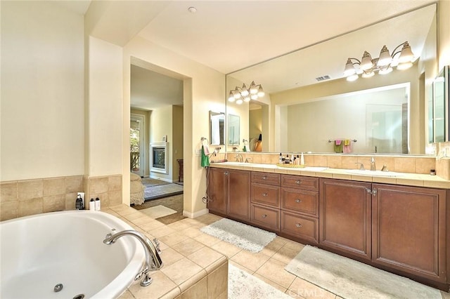 18977 Phelham Way, Yorba Linda, CA 92886 - bathroom with double vanity, a whirlpool tub, and tile patterned flooring