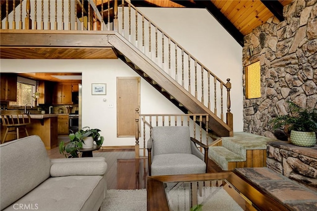 28645 Shenandoah Dr, Lake Arrowhead, CA 92352 - living room featuring a wood ceiling with exposed beams, hardwood / wood-style flooring, stairway, and high vaulted ceiling