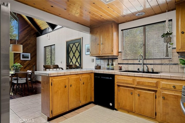 28645 Shenandoah Dr, Lake Arrowhead, CA 92352 - kitchen featuring black dishwasher, wood ceiling, light tile patterned flooring, backsplash, and wood walls