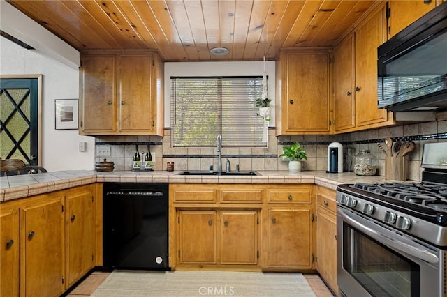28645 Shenandoah Dr, Lake Arrowhead, CA 92352 - kitchen with black appliances, wooden ceiling, decorative backsplash, light tile patterned floors, and brown cabinets