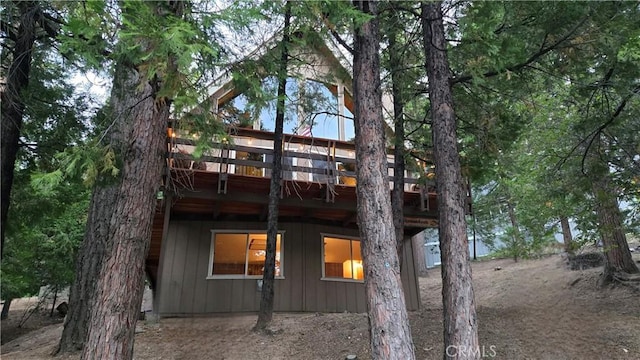 28645 Shenandoah Dr, Lake Arrowhead, CA 92352 - rear view of property with a deck and board and batten siding