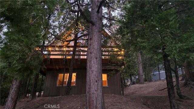 28645 Shenandoah Dr, Lake Arrowhead, CA 92352 - back of property with a deck