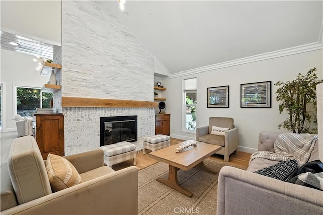 24901 Del Monte St, Laguna Hills, CA 92653 - living room with wood finished floors, plenty of natural light, high vaulted ceiling, and a stone fireplace