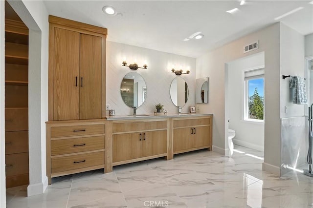 24901 Del Monte St, Laguna Hills, CA 92653 - full bathroom featuring double vanity, marble finish floors, recessed lighting, and a closet