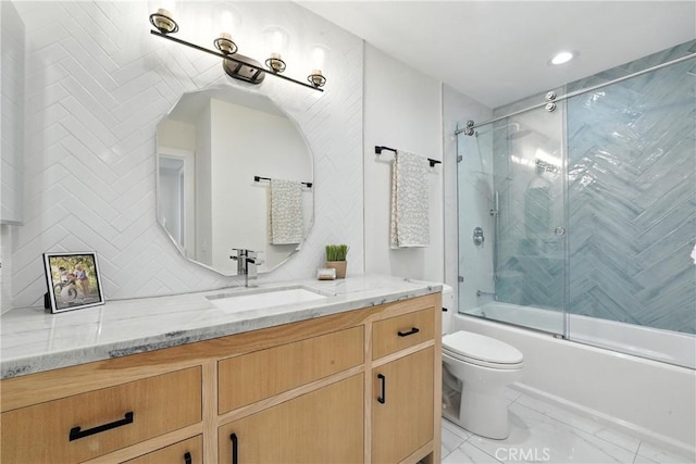 24901 Del Monte St, Laguna Hills, CA 92653 - bathroom with vanity, bath / shower combo with glass door, backsplash, marble finish flooring, and recessed lighting