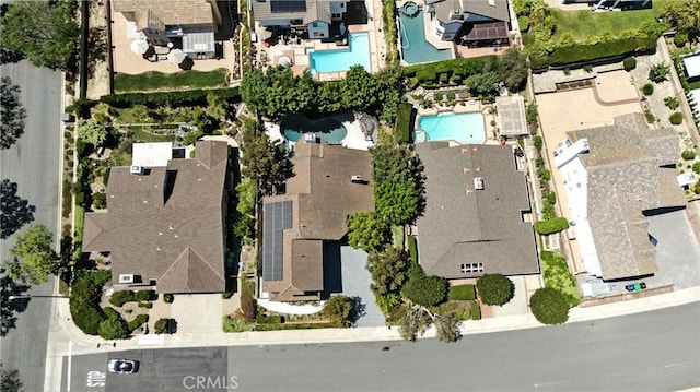 24901 Del Monte St, Laguna Hills, CA 92653 - aerial view of property and surrounding area featuring a pool area and nearby suburban area