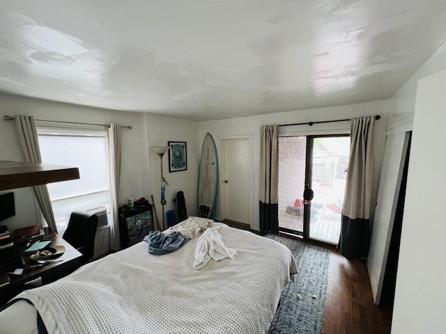 3943 Ingraham St, San Diego, CA 92109 - bedroom featuring access to outside and dark wood-style floors