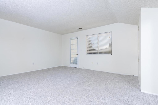 10500 Flora Azalea Ct, Santee, CA 92071 - carpeted empty room with a textured ceiling and vaulted ceiling