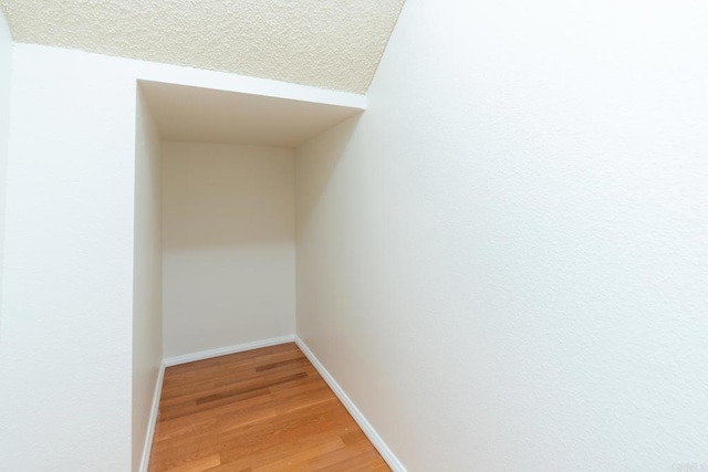 10500 Flora Azalea Ct, Santee, CA 92071 - hallway with light wood-type flooring and baseboards