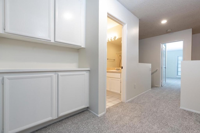 10500 Flora Azalea Ct, Santee, CA 92071 - hall with light colored carpet, recessed lighting, and a textured ceiling