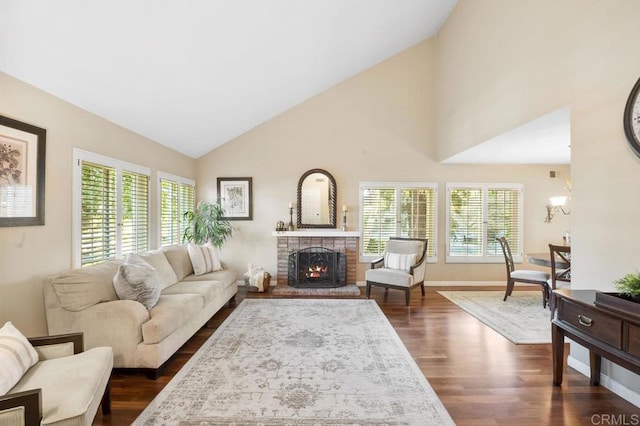 1772 Treseder Cir, El Cajon, CA 92019 - living room featuring healthy amount of natural light, dark wood finished floors, high vaulted ceiling, and a brick fireplace