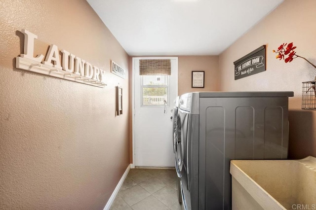 1772 Treseder Cir, El Cajon, CA 92019 - laundry room with washing machine and clothes dryer and light tile patterned floors