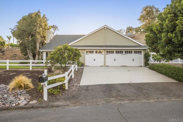 1772 Treseder Cir, El Cajon, CA 92019 - view of front facade featuring a chimney, roof with shingles, concrete driveway, and an attached garage