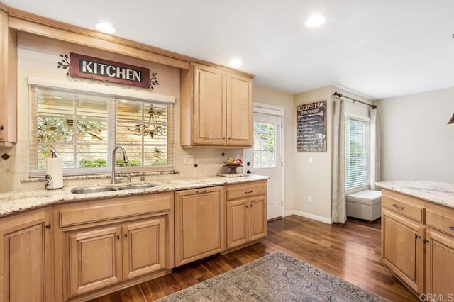 1772 Treseder Cir, El Cajon, CA 92019 - kitchen with dark wood-type flooring, light brown cabinets, backsplash, recessed lighting, and light stone countertops