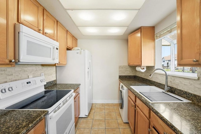 830 Broadway Unit 18, El Cajon, CA 92021 - kitchen with white appliances, washer / dryer, backsplash, and light tile patterned flooring