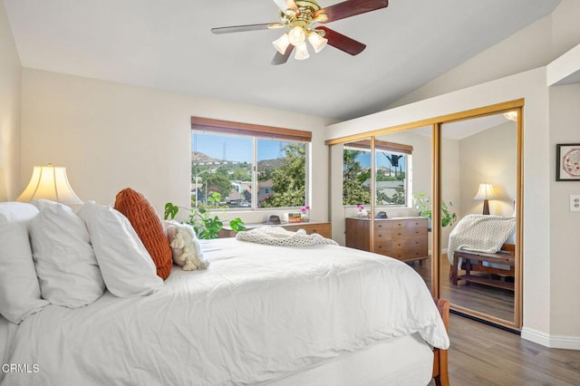28802 Raintree Ln, Saugus, CA 91390 - bedroom featuring wood finished floors, lofted ceiling, a closet, and ceiling fan