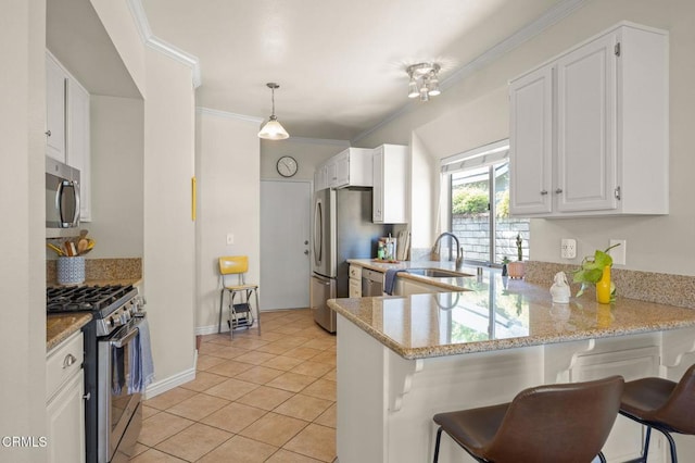 28802 Raintree Ln, Saugus, CA 91390 - kitchen featuring stainless steel appliances, a peninsula, white cabinets, light stone counters, and light tile patterned floors