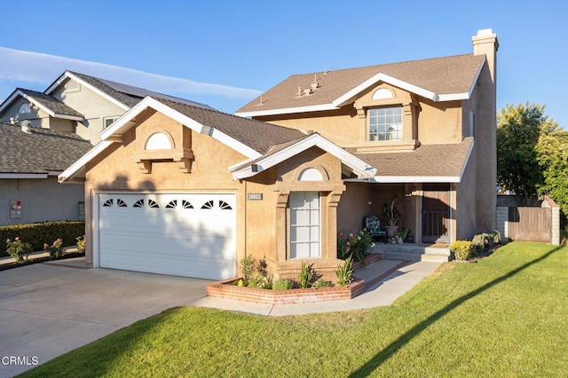 28802 Raintree Ln, Saugus, CA 91390 - traditional-style home with an attached garage, concrete driveway, stucco siding, a chimney, and a front yard