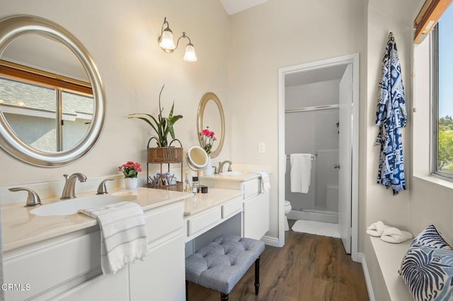 28802 Raintree Ln, Saugus, CA 91390 - bathroom with double vanity, a stall shower, and wood finished floors