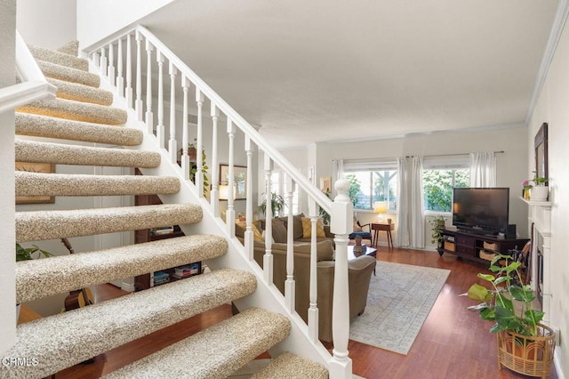 28802 Raintree Ln, Saugus, CA 91390 - stairs with wood finished floors and ornamental molding