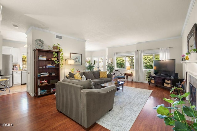 28802 Raintree Ln, Saugus, CA 91390 - living area featuring ornamental molding, wood finished floors, and a fireplace with flush hearth