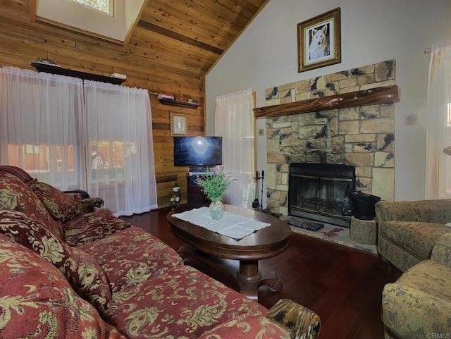 4822 Belvedere Dr, Julian, CA 92036 - living area featuring hardwood / wood-style flooring, wood walls, high vaulted ceiling, wooden ceiling, and a stone fireplace