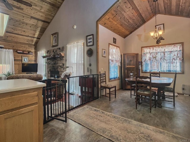 4822 Belvedere Dr, Julian, CA 92036 - dining room with wooden ceiling, finished concrete floors, high vaulted ceiling, a chandelier, and a ceiling fan