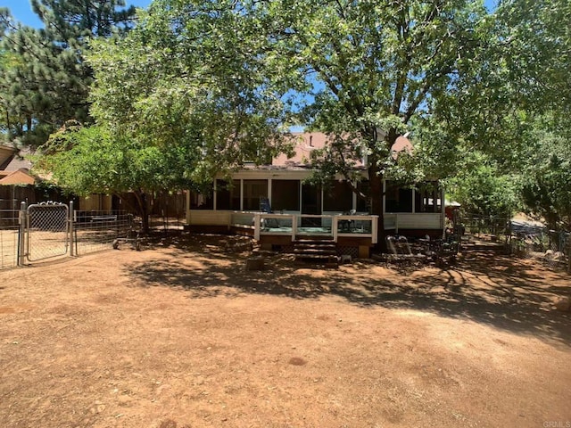 4822 Belvedere Dr, Julian, CA 92036 - back of property with a sunroom and a gate
