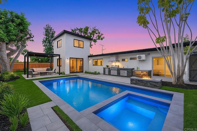 709 Puebla St, Encinitas, CA 92024 - rear view of house with outdoor lounge area, exterior kitchen, an in-ground hot tub, an AC wall unit, and a patio area