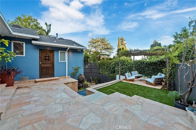 2531 N Commonwealth Ave, Los Angeles, CA 90027 - fenced backyard with a patio area