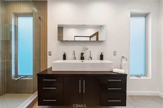 2531 N Commonwealth Ave, Los Angeles, CA 90027 - full bath featuring vanity and a tile shower